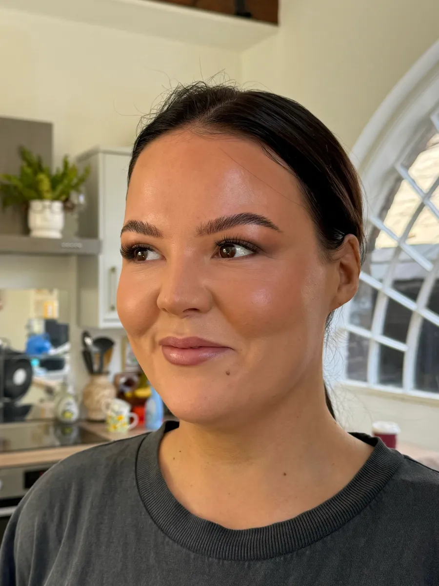 Soft glam makeup in side profile by Lucy Mae